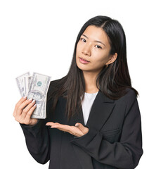 Chinese businesswoman with money