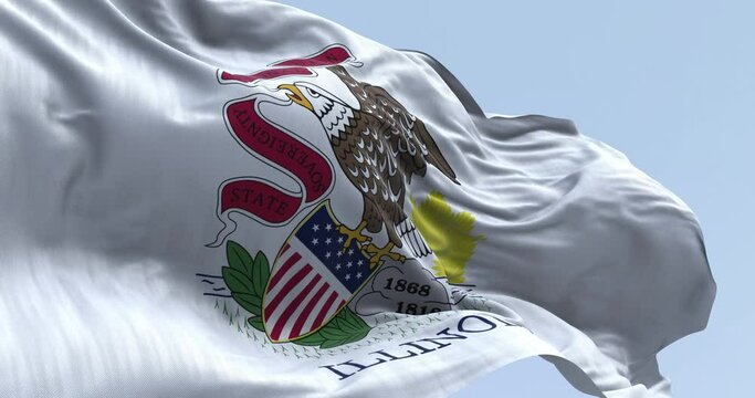 Close-up of the Illinois state flag waving in the wind on a clear day