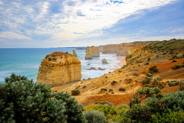 The Twelve Apostles, a collection of limestone stacks in the Tasman Sea off the coast of Victoria,...
