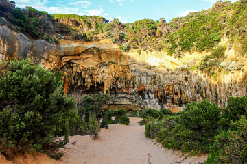Limestone cave on the rock face of the Loch Ard Gorge in the Twelve Apostles Marine National Park...