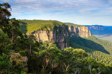View over the cliffs and lush valleys of the Blue Mountains National Park from Govetts Leap Lookout in New South Wales, Australia