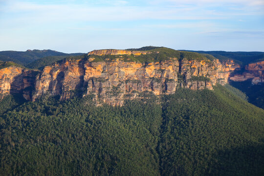View over the cliffs and lush valleys of the Blue Mountains National Park from the Pulpit Rock Lookout in New South Wales, Australia