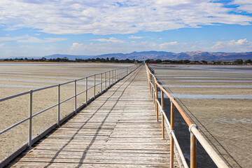 Obraz premium Port Germein jetty in South Australia, opened in 1881 and is 1532 metres long. Due to the very shallow waters of the township, it used to be the longest wooden jetty in the southern hemisphere