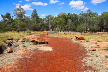 Footpath in the Alice Springs Telegraph Station Historical Reserve in the Red Centre of Australia, connecting Darwin to Adelaide via the Overland Telegraph Line