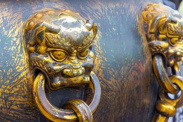 Bronze dragon knockers in Beijing, China