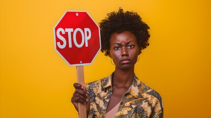 Serious woman holding stop sign, strong message concept. studio portrait, bold colors. demand for action and awareness. AI