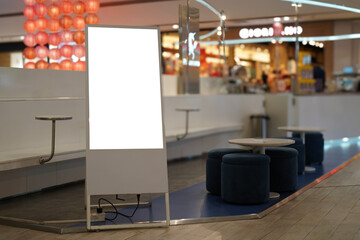Vertical Blank Signboard Mockup in Modern Shopping Mall, Perfect for Advertising - 742664168