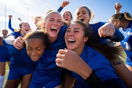 Women s soccer team celebrating victory