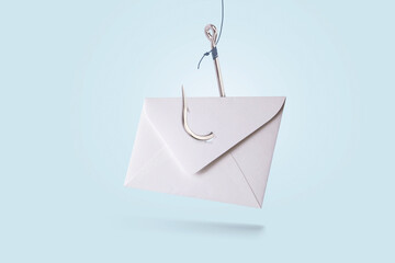 Paper mail letter with metal hook on blue pastel background, concept. Phishing and hacker attack via email, creative idea. Hackers and spam mailing. Data theft. Trap and deception - obrazy, fototapety, plakaty