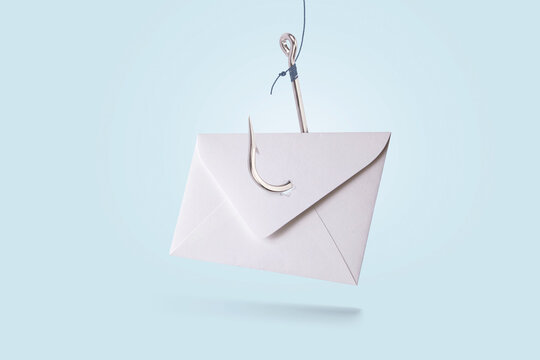 Paper mail letter with metal hook on blue pastel background, concept. Phishing and hacker attack via email, creative idea. Hackers and spam mailing. Data theft. Trap and deception