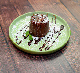 Flat lay composition with sweet chocolate mousse in glass on table