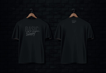 Men's black short sleeve t-shirt mockup in black wall surface with dark bricks. Front view. Vector template.