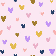 Seamless heart pattern has hand drawn hearts in various colors such as pink, purple, blue, brown, yellow on a pink background. Suitable for wallpaper, textiles and prints.