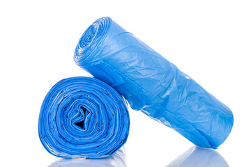 Two packs of plastic garbage bags, macro, isolated on white background.