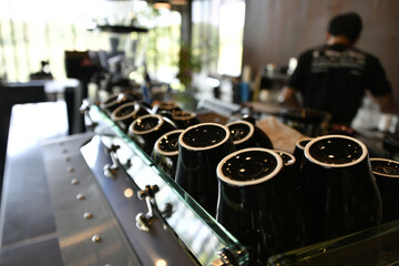 Black set of coffee cup on a bar