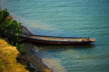 An empty boat on sea side