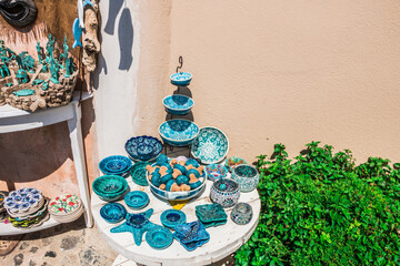 traditional Mediterranean souvenirs for tourists on Santorini island. Greece.