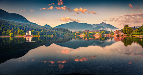Panoramic summer view of Grundlsee lake. Impressive morning scene of Grundlsee village, Liezen District of Styria, Austria, Europe. Beauty of countryside concept background.