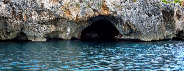 The caves on the Adriatic side of Santa Maria di Leuca seen from the tourist boat




