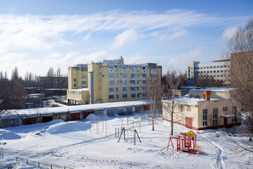 multi-storey residential building against the blue sky in winter