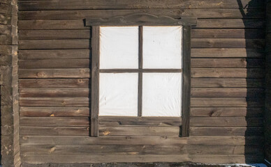 background wall with wooden windows