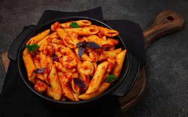 Penne pasta, with shrimp in tomato sauce, close-up, no people,