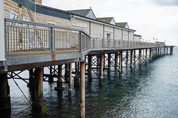 View of one side of the Victorian pier at Teignmouth, Devon UK