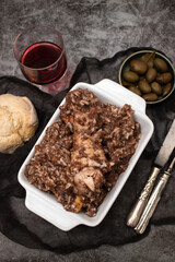 Typical portuguese dish chicken with rice on dish.