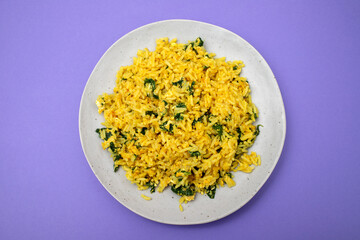 rice with egg and spinach on plate
