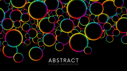 Luminous floating balls shine with rainbow colors on black background. Colorful rainbow random flying glowing circles, spheres or bubbles. Fluorescent circle particles dynamic flow. Vector background