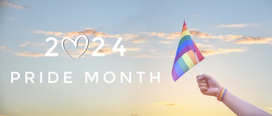 2024 Pride Month and rainbow flags raising on sunset background, concept for special celebrations...