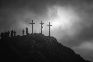 Foto op Plexiglas three crosses on top of hill stand against a darkening sky. © Gasi