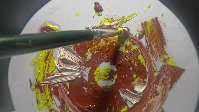 Paintings and art create a colorful art creation using a brush