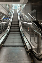 An empty escalator seen from the bottom up