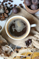 Obraz na płótnie Canvas A Cup of Coffee on Wooden Table