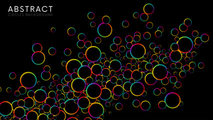 Fluorescent circle particles dynamic flow. Luminous floating balls shine with rainbow colors on black background. Colorful rainbow random flying glowing circles, spheres or bubbles. Vector background