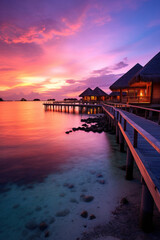 Obraz premium Maldives at a resort on the island at sunset.