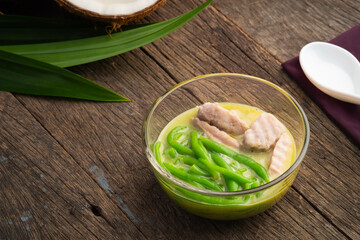 Lod chong with taro,Thai dessert made from flour in palm sugar syrup and coconut milk in glass bowl
