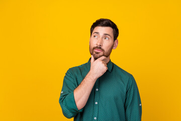 Portrait of minded clever man with beard wear stylish shirt thoughtfully look at empty space...