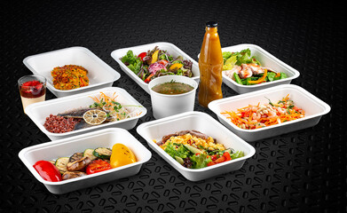 A variety of healthy and delicious meal options in eco-friendly takeaway containers.