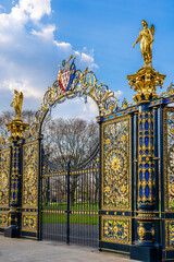 The Golden Gates, historical ornate Victorian gateway from 1862 located in front of the Town Hall in Warrington, Cheshire, England, UK; Text: 