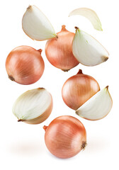 Yellow onion and pieces of onion falls on a white background.
