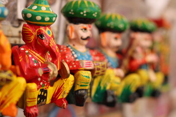 Vibrant Rajasthan puppets adorning the shop at Jodhpur City Palace, India