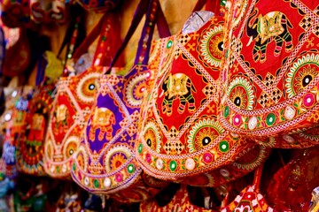 Vibrant Rajasthan puppets adorning the shop at Jodhpur City Palace, India