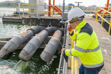 Environmental engineers work at wastewater treatment plants,Water supply engineering working at...