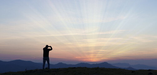 Photos at sunset. Man photographing the sunset in euskadi.