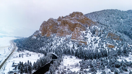 Snow covered mountains canyon through the river road