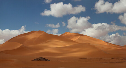 View of desert sand dunes at sunset near Ghat, Sahara desert, Libya.