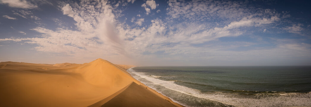 View of sand dunes from the Namib desert along the coastline facing the Atlantic Ocean, Namibia.