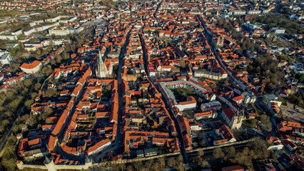 Aerial around the old town of the city Mühlhausen in Thuringia, Germany on a sunny day day in winter	